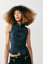 Top peplum à brandebourgs en lin