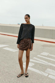 Jupe-culotte mini à sequins avec nœud