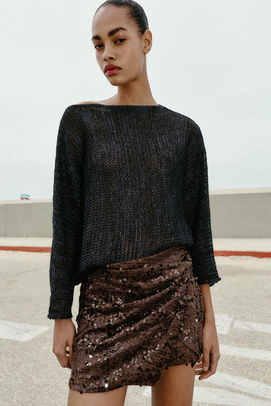 Jupe-culotte mini à sequins avec nœud