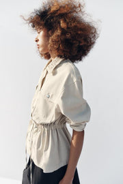 Veste safari à revers au crochet