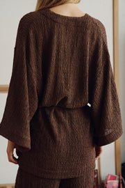 Veste avec ceinture effet froissé