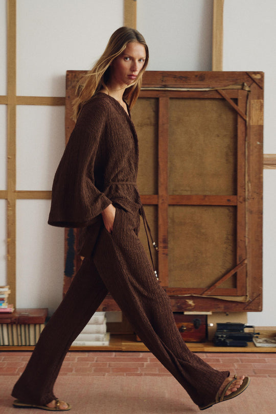 Veste avec ceinture effet froissé