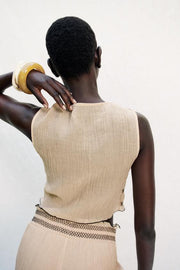 Top façon gilet à coutures contrastées
