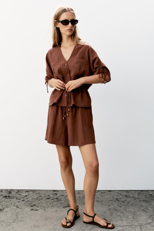 Veste safari à manches courtes à perles