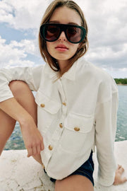Blouson à boutons dorés