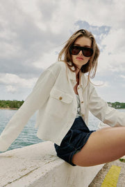 Blouson à boutons dorés
