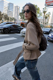 Manteau court en laine avec ceinture