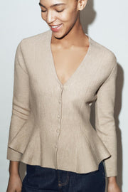 Veste en maille peplum