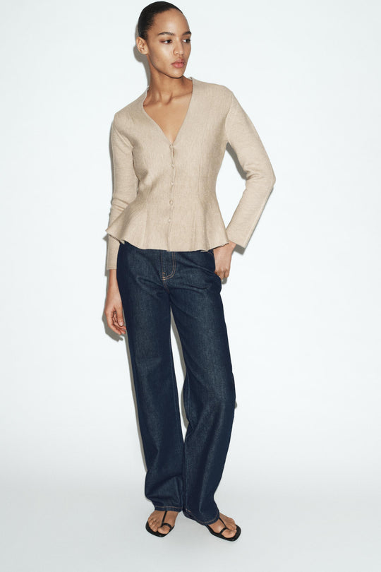 Veste en maille peplum