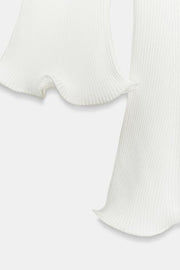 Robe en maille côtelée à finition ondulée