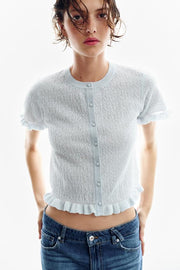 Veste en maille structurée à volants