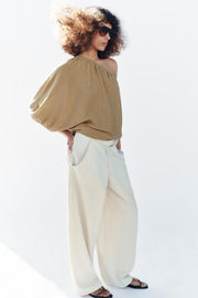 Top en maille asymétrique