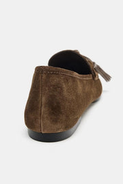 Mocassin en cuir à pompons