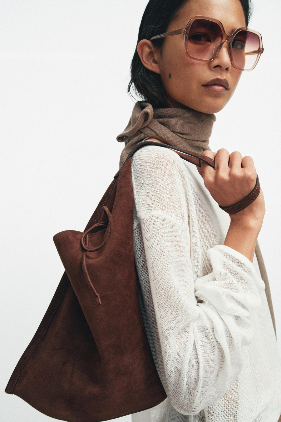 Sac plat en cuir avec nœud
